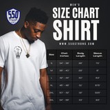 a man standing in front of a black and white poster